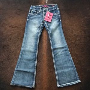 Rock and Roll Cowgirl bootcut jeans. Brand New